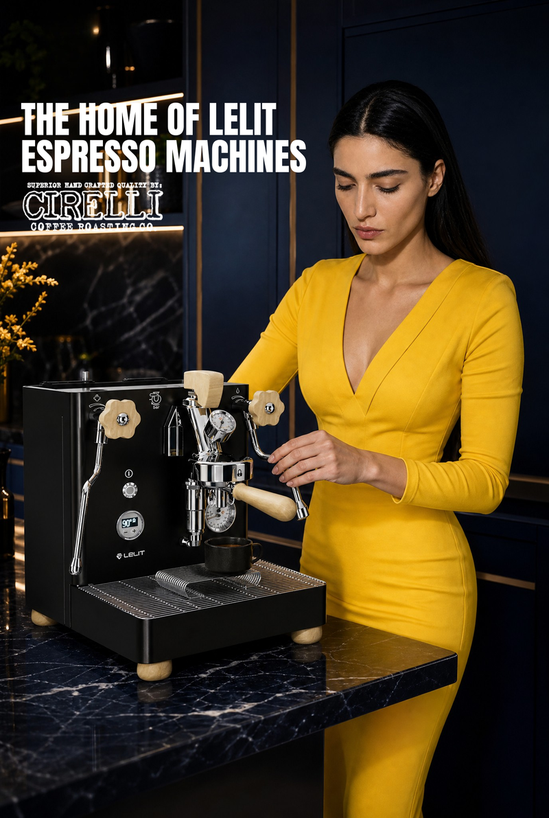 A woman in a bright yellow dress stands beside a black Cilelli espresso machine on a dark marble counter in a modern kitchen setting. Large text at the top reads 'THE HOME OF LELIT ESPRESSO MACHINES' with the Cilelli logo below it.