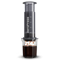 AeroPress XL Coffee Maker from Cirelli Coffee, a larger AeroPress brewer with double the capacity, rapid immersion brewing, 100 filters, scoop, stirrer and half-litre carafe for smooth coffee at home, work or travel.