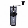 Hario Coffee Mill Smart G MSG-2-TB from Cirelli Coffee, a compact manual hand coffee grinder with BPA-free transparent black plastic body, ceramic conical burrs, adjustable grind settings and 24g coffee capacity for home, office, travel and filter coffee brewing.