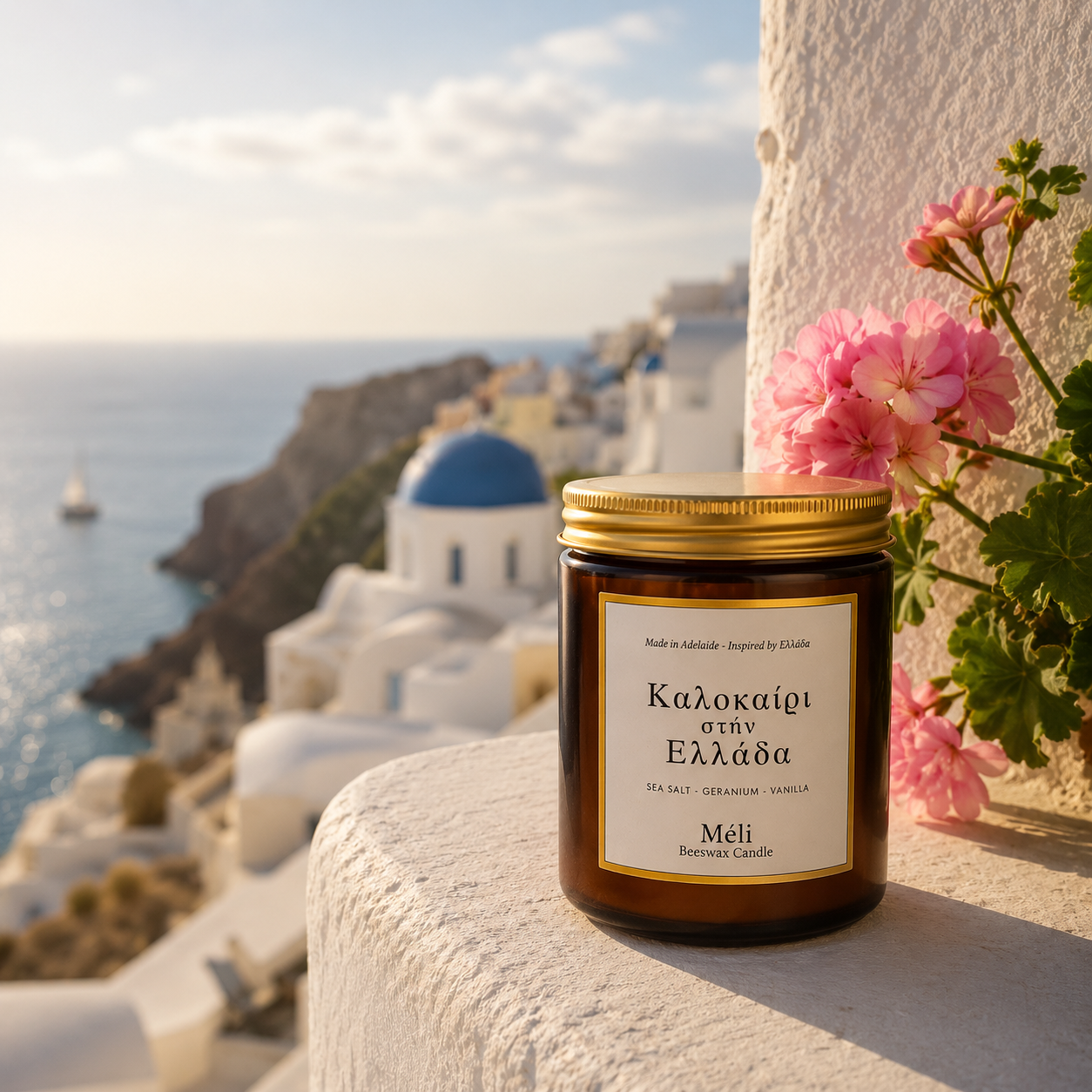 Meli Kalokeri Stin Ellada Summer in Greece Beeswax Candle 180g from Cirelli Coffee, a South Australian beeswax candle in a gloss amber jar with gold lid, wood wick, 35-hour burn time, and fresh sea salt, geranium and vanilla fragrance notes.