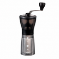 Hario Mini Slim Plus Black MSS-1DTB from Cirelli Coffee, a compact manual hand coffee grinder made in Japan with adjustable ceramic conical burrs, sturdier handle, scratch-resistant black casing and consistent grind performance for home, office, travel and manual coffee brewing.