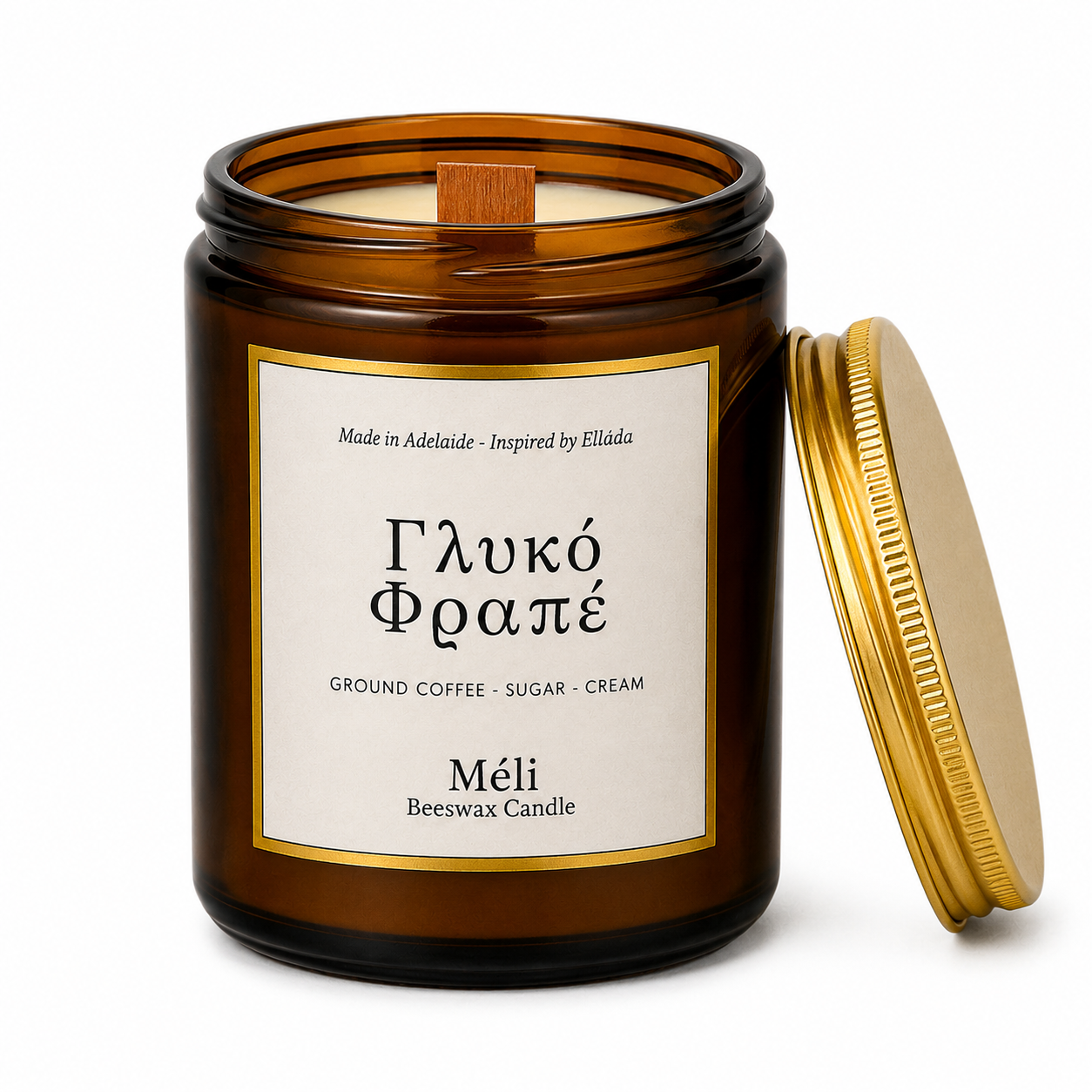 Meli Glyko Frappe Sweet Frappe Beeswax Candle 180g from Cirelli Coffee, a South Australian beeswax candle in a gloss amber jar with gold lid, wood wick, 35-hour burn time, and sweet coffee, sugar and cereal fragrance notes.