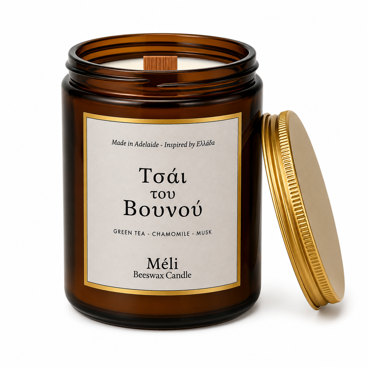 Meli Mountain Tea Tsai Tou Vonou Beeswax Candle 180g from Cirelli Coffee, a South Australian beeswax candle in a gloss amber jar with gold lid, wood wick, and calming green tea, chamomile and soft musk fragrance notes.