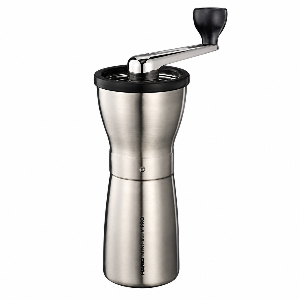 Hario Coffee Mill Slim Pro from Cirelli Coffee, a slim manual coffee grinder with stainless steel body, cast aluminium handle, ceramic conical burrs, adjustable grind coarseness and 24g roasted coffee capacity for home, office, travel and filter coffee brewing.